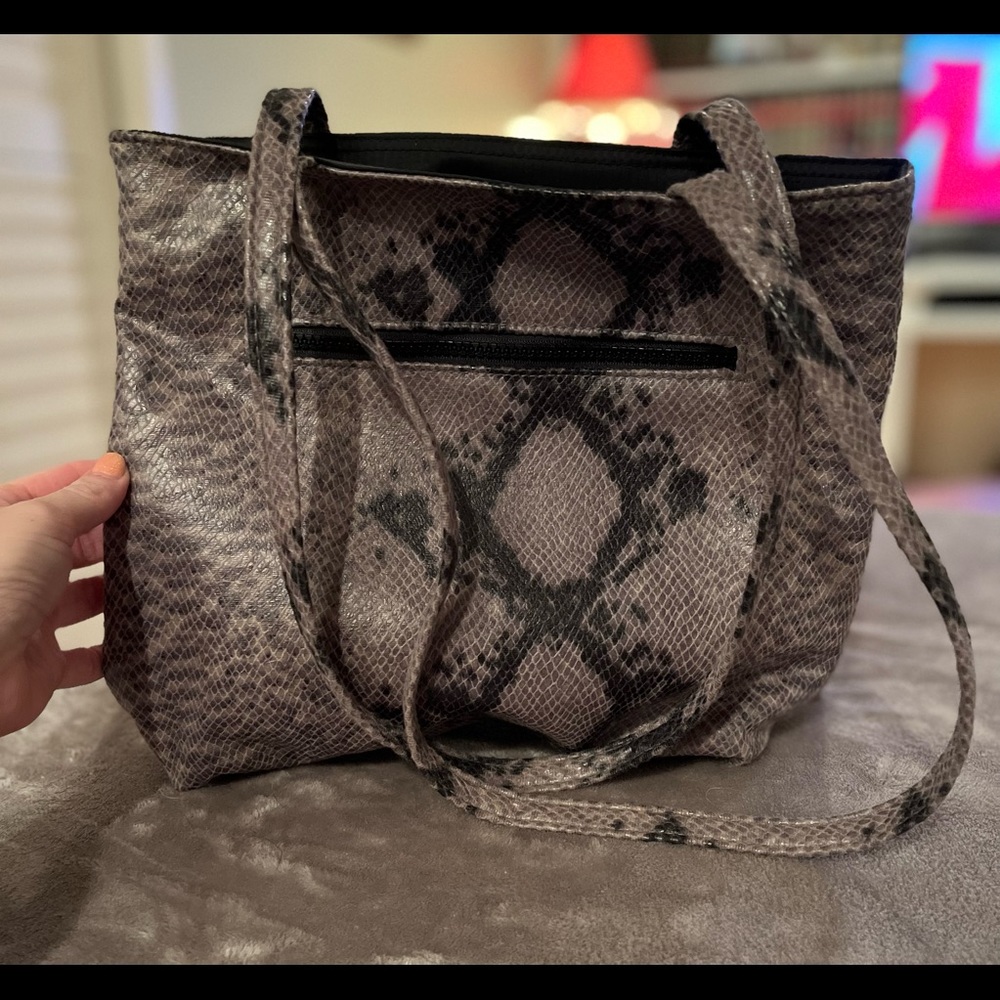 Faux snake skin purse.